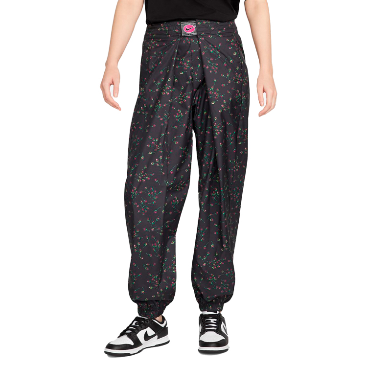 Брюки Nike W NSW IC AOP MR WVN PANT photo 1 Брюки Nike W NSW IC AOP MR WVN PANT photo 1